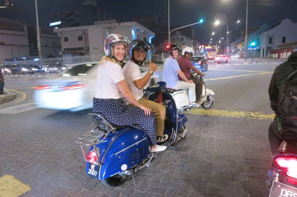 ride around the city in a vespa