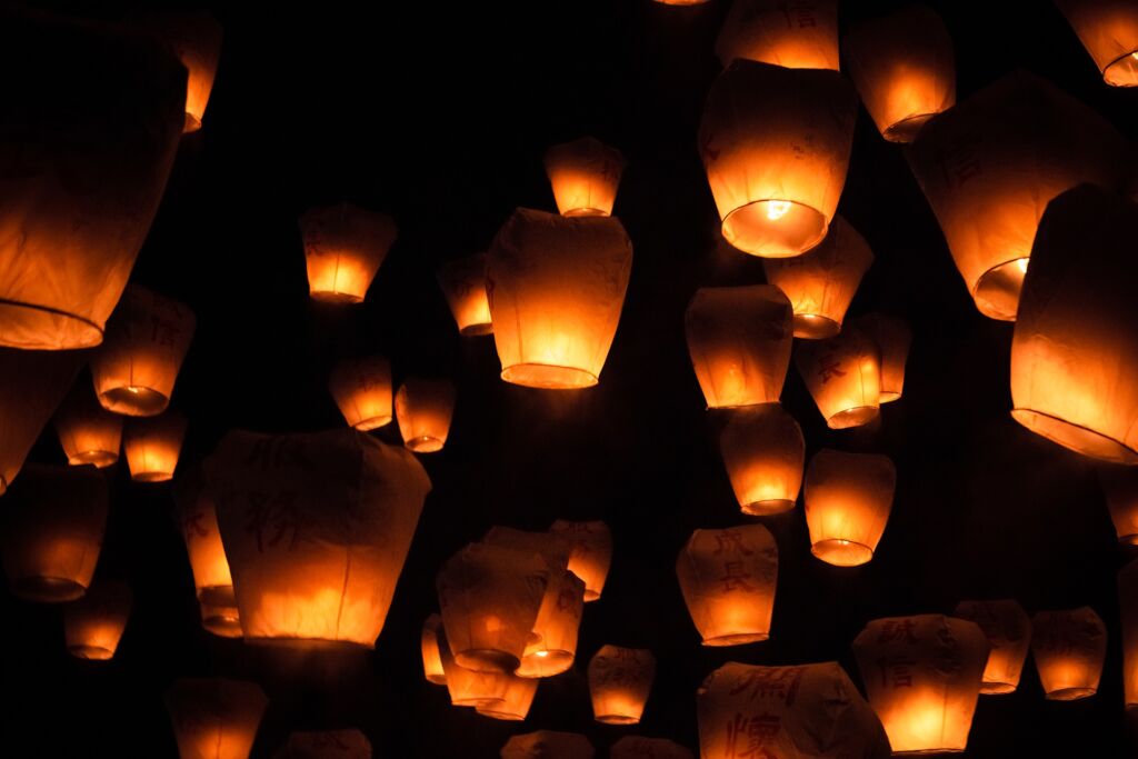 Wish lanterns taking flight