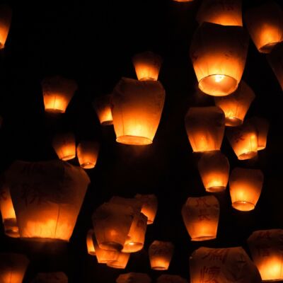 Wish lanterns taking flight