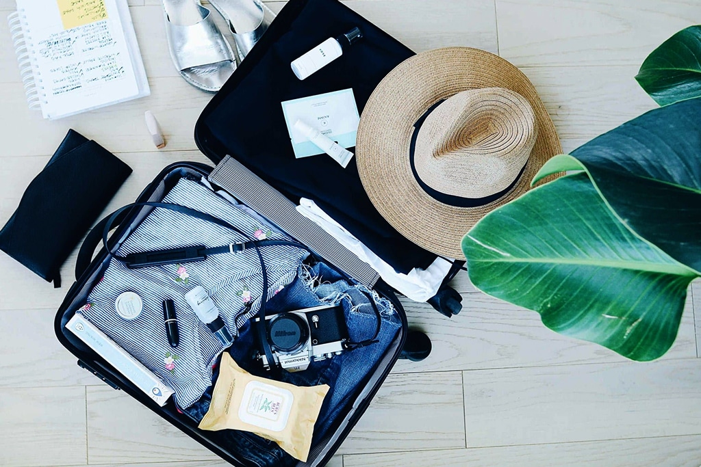 business woman packing luggage